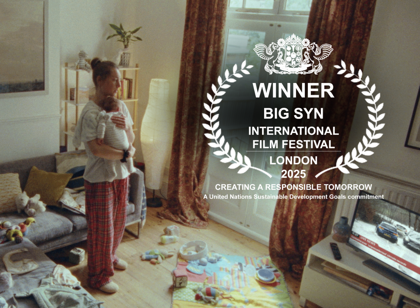 A freeze frame from Parents for Future UK's film, with a winners laurel is stamped on top of the shot