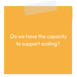 Yellow sticky note reading: Do we have the capacity to support scaling?