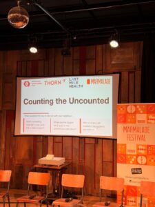 The start of the event on 'Counting the Uncounted'. The presentation screen says the title of the discussion, along with the names of the panel organisations.